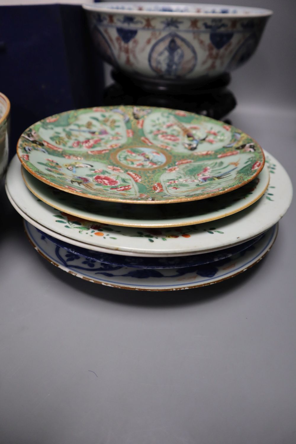 A group of Chinese and Japanese porcelain bowls and plates, 18th century and later, together with a Chinese hardstone censer and cover,